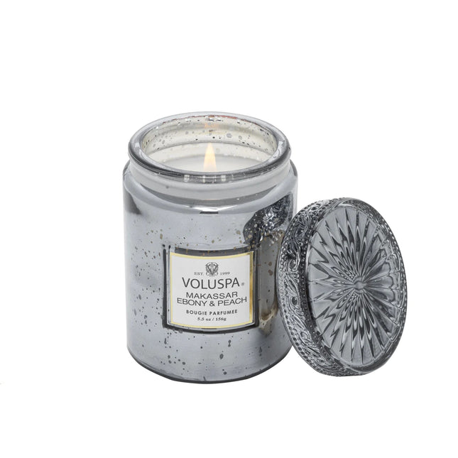 شمعة فولوسبا "ماكاسار الأبنوس والخوخ" في جرة