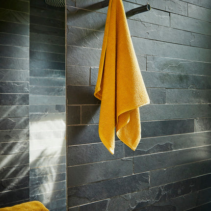 Christy "Brixton" Bath Towels Collection in Saffron Gold